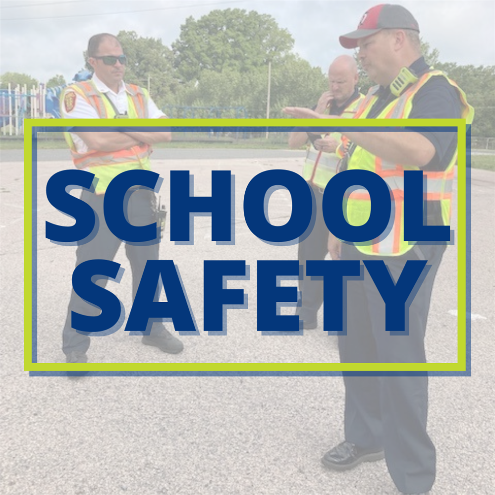  School safety written over image of emergency responders talking